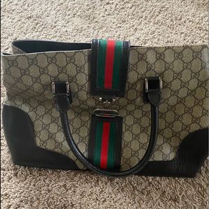 Authentic leather Gucci purse, used as display